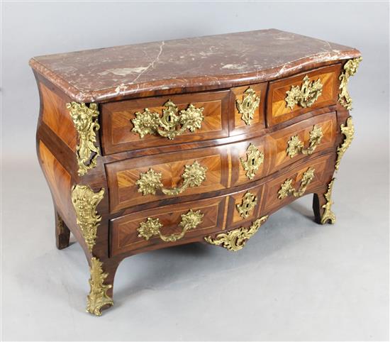 A Louis XV ormolu mounted kingwood bombe commode, W.4ft 2in. D.2ft 2in. H.2ft 11in.